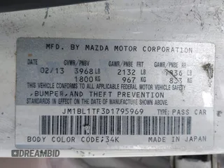 2013 Mazda 3 i SV with VIN JM1BL1TF3D1795969, listed as a IAAI auction lot 42075242 with 169,331 mi miles. Bid and sale history available at carsss.com. Image 9.