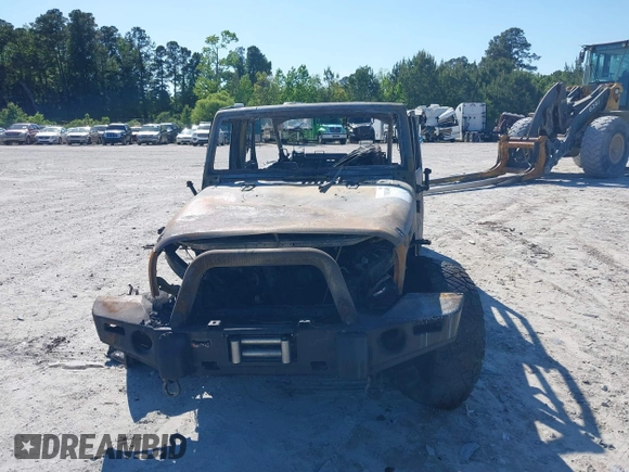 2017 Jeep Wrangler Unlimited Sahara with VIN 1C4HJWEG6HL638014, listed as a IAAI auction lot 39915512 with Not provided miles and . Bid and sale history available at DreamBid. Image 6.