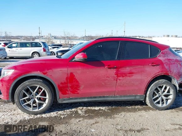 2019 Alfa Romeo Stelvio z VIN ZASPAKAN9K7C49108, wystawiony jako IAAI lot #41365234 z przebiegiem 53 196 mil mil oraz . Historia ofert i sprzedaży dostępna na DreamBid. Obrazek 13.