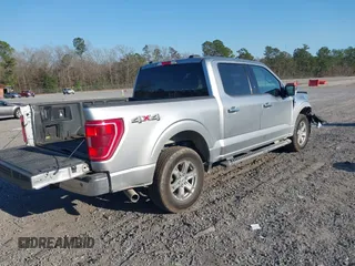 2021 Ford F-150 XL with VIN 1FTFW1E58MFA73753, listed as a IAAI auction lot 41707310 with 138,450 mi miles. Bid and sale history available at carsss.com. Image 4.