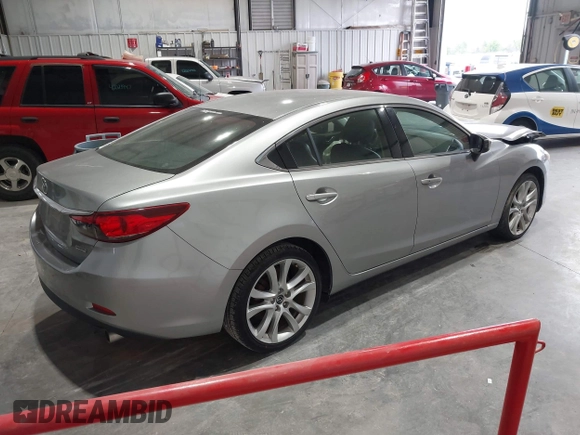 2014 Mazda 6 i Touring with VIN JM1GJ1T51E1106970, listed as a IAAI auction lot 42027350 with 113,756 mi miles and . Bid and sale history available at DreamBid. Image 4.