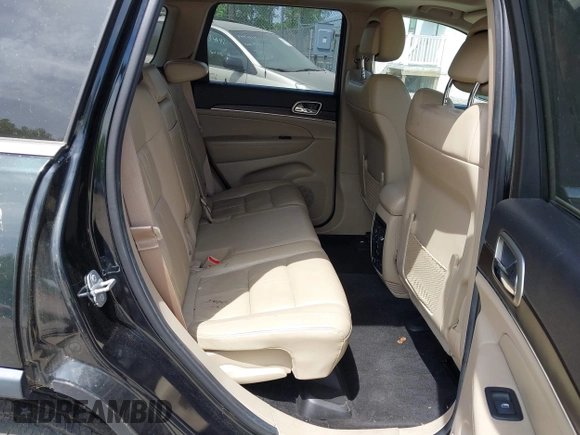 2014 Jeep Grand Cherokee Limited with VIN 1C4RJFBG3EC497939, listed as a IAAI auction lot 42127152 with 112,095 mi miles and . Bid and sale history available at DreamBid. Image 8.