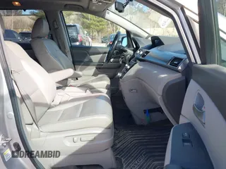 2012 Honda Odyssey Touring with VIN 5FNRL5H95CB063003, listed as a IAAI auction lot 41871975 with 179,332 mi miles and . Bid and sale history available at DreamBid. Image 5.