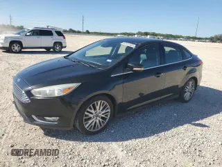 2015 Ford Focus Titanium with VIN 1FADP3J24FL305710, listed as a Copart auction lot 52413155 with 181,571 mi miles and Clean Title. Bid and sale history available at carsss.com. Image 1.
