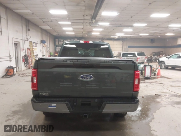 2021 Ford F-150 XL with VIN 1FTFW1E59MKD82204, listed as a IAAI auction lot 41466186 with 56,839 mi miles. Bid and sale history available at carsss.com. Image 14.