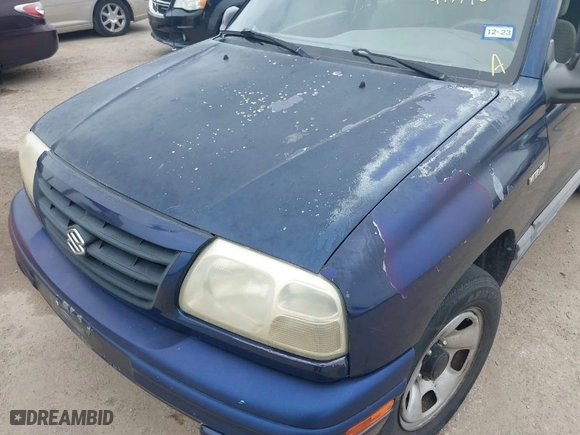 2002 Suzuki Vitara JLX with VIN 2S3TD52V026102000, listed as a IAAI auction lot 41579808 with 1,949,292 mi miles. Bid and sale history available at carsss.com. Image 6.