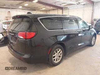 2017 Chrysler Pacifica Touring with VIN 2C4RC1DG3HR571477, listed as a IAAI auction lot 42040872 with 112,028 mi miles and . Bid and sale history available at DreamBid. Image 4.