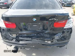 2014 BMW 3 Series 328i with VIN WBA3C1C55EK115218, listed as a IAAI auction lot 41824817 with 101,941 mi miles. Bid and sale history available at carsss.com. Image 6.