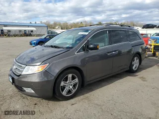 2013 Honda Odyssey Touring with VIN 5FNRL5H96DB010599, listed as a Copart auction lot 52316325 with 179,840 mi miles and Salvage Title. Bid and sale history available at carsss.com. Image 1.