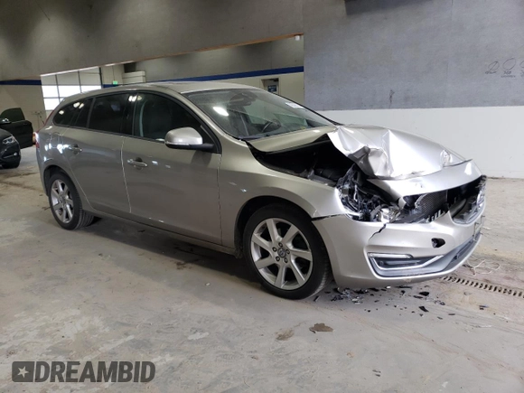 2015 Volvo V60 T5 Drive-E with VIN YV140MEJ3F1246824, listed as a Copart auction lot 76025774 with 95,055 mi miles and Salvage Title. Bid and sale history available at carsss.com. Image 4.
