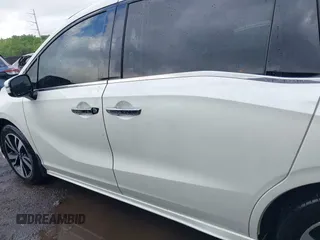 2018 Honda Odyssey Elite z VIN 5FNRL6H94JB008108, wystawiony jako IAAI lot #42126779 z przebiegiem 93 859 mil mil oraz . Historia ofert i sprzedaży dostępna na DreamBid. Obrazek 14.