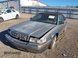 1992 Cadillac Seville z VIN 1G6EL13B2N0612154, wystawiony jako IAAI lot #41757101 z przebiegiem Nie podano mil oraz . Historia ofert i sprzedaży dostępna na DreamBid. Obrazek 6.