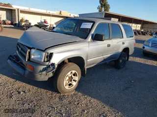 1998 Toyota 4Runner with VIN JT3GM84R8W0029317, listed as a IAAI auction lot 41667973 with 214,347 mi miles. Bid and sale history available at carsss.com. Image 2.