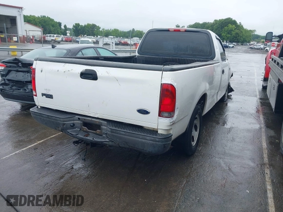 2002 Ford F-150 XL with VIN 1FTRF17242NB86232, listed as a IAAI auction lot 42336859 with 119,321 mi miles and . Bid and sale history available at DreamBid. Image 4.