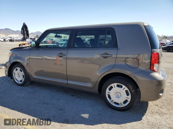 2012 Scion xB with VIN JTLZE4FE6CJ023059, listed as a Copart auction lot 49843555 with 145,371 mi miles and Salvage Title. Bid and sale history available at carsss.com. Image 2.