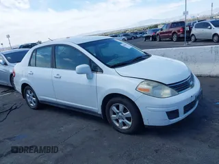 2007 Nissan Versa 1.8 S with VIN 3N1BC11E47L439072, listed as a IAAI auction lot 42083801 with 215,096 mi miles. Bid and sale history available at carsss.com. Image 13.