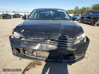 2016 Volkswagen Passat 1.8T SE with VIN 1VWBT7A38GC015188, listed as a Copart auction lot 87378074 with 210,563 mi miles and Salvage Title. Bid and sale history available at carsss.com. Image 5.
