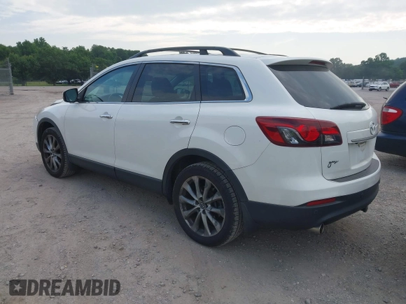 2015 Mazda CX-9 Grand Touring with VIN JM3TB2DA7F0448886, listed as a IAAI auction lot 42440203 with 108,765 mi miles and . Bid and sale history available at DreamBid. Image 3.