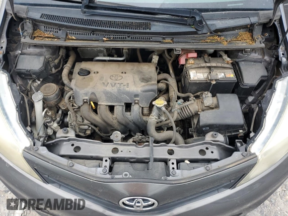 2012 Toyota Yaris L z VIN JTDJTUD3XCD512501, wystawiony jako Copart lot #56353845 z przebiegiem 148 907 mil mil oraz Czysty tytuł • Clean title. Historia ofert i sprzedaży dostępna na DreamBid. Obrazek 11.