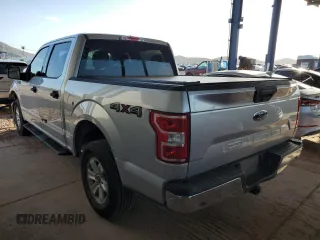 2018 Ford F-150 XL with VIN 1FTEW1E58JFA19859, listed as a Copart auction lot 63862625 with 77,463 mi miles and Salvage title. Bid and sale history available at DreamBid. Image 2.