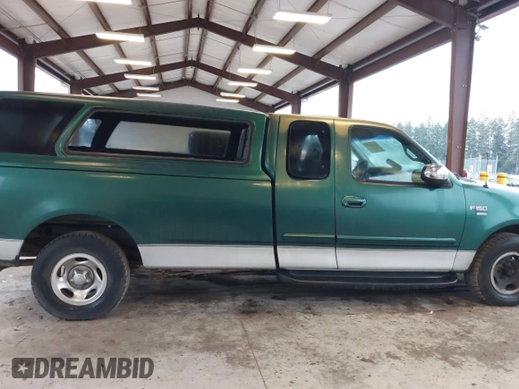 1999 Ford F-150 with VIN 2FTRX17L9XCA19030, listed as a IAAI auction lot 41232157 with Not provided miles and . Bid and sale history available at DreamBid. Image 14.