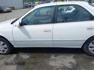 2001 Toyota Camry CE z VIN 4T1BG22KX1U767696, wystawiony jako IAAI lot #42271803 z przebiegiem 130 927 mil mil oraz . Historia ofert i sprzedaży dostępna na DreamBid. Obrazek 14.
