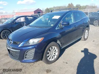2010 Mazda CX-7 SV with VIN JM3ER2W57A0345450, listed as a IAAI auction lot 41667219 with 166,860 mi miles. Bid and sale history available at carsss.com. Image 2.