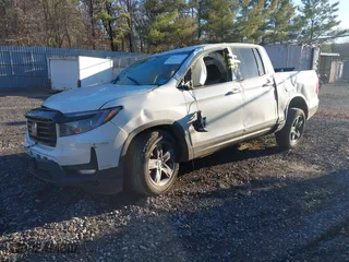 2021 Honda Ridgeline Sport with VIN 5FPYK3F1XMB011441, listed as a IAAI auction lot 41315524 with 59,840 mi miles. Bid and sale history available at carsss.com. Image 2.