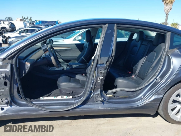 2022 Tesla Model 3 with VIN 5YJ3E1EA8NF241691, listed as a IAAI auction lot 41742584 with 70,375 mi miles and . Bid and sale history available at DreamBid. Image 14.