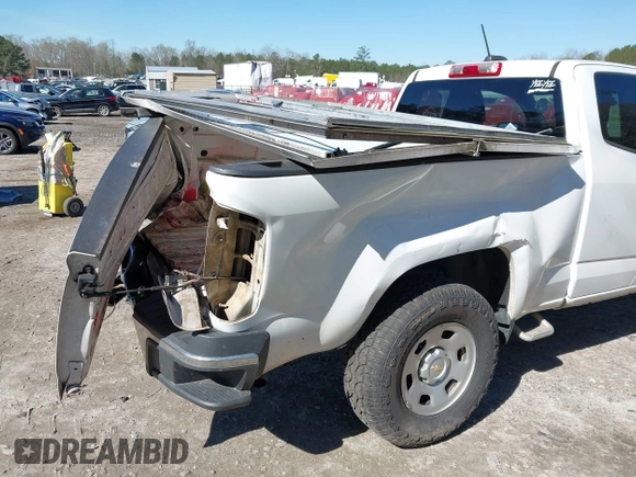 2018 Chevrolet Colorado 2WD Work Truck z VIN 1GCHSBEA9J1193173, wystawiony jako IAAI lot #41869427 z przebiegiem 154 123 mil mil oraz . Historia ofert i sprzedaży dostępna na DreamBid. Obrazek 6.