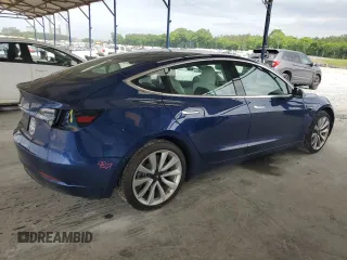 2019 Tesla Model 3 Mid Range z VIN 5YJ3E1EA1KF417900, wystawiony jako Copart lot #55310265 z przebiegiem 45 739 mil mil oraz Szkoda całkowita • Salvage title. Historia ofert i sprzedaży dostępna na DreamBid. Obrazek 3.