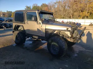 2004 Jeep Wrangler Rubicon with VIN 1J4FA69S74P787812, listed as a Copart auction lot 84715464 with 150,320 mi miles and Salvage Title. Bid and sale history available at carsss.com. Image 4.