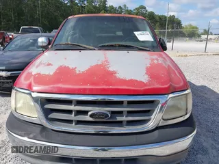 2002 Ford F-150 XL with VIN 1FTRX17W12NA07936, listed as a IAAI auction lot 42068598 with 1 mi miles. Bid and sale history available at carsss.com. Image 6.