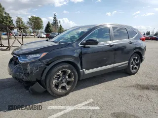 2017 Honda CR-V Touring with VIN 2HKRW1H99HH515480, listed as a Copart auction lot 51869635 with 24,393 mi miles and Salvage Title. Bid and sale history available at carsss.com. Image 1.