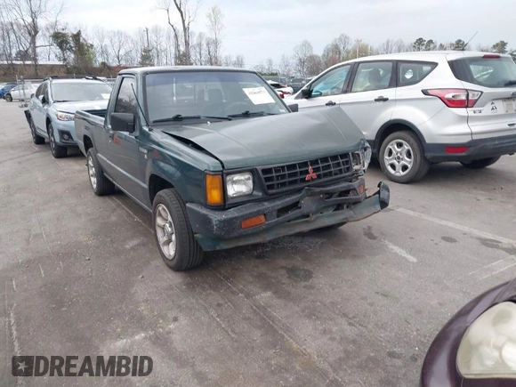 1992 Mitsubishi Mighty Max z VIN JA7FL24W5NP011633, wystawiony jako IAAI lot #41864873 z przebiegiem 301 895 mil mil oraz . Historia ofert i sprzedaży dostępna na DreamBid. Obrazek 1.