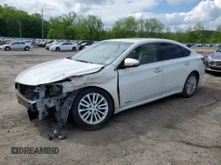 2014 Toyota Avalon Limited z VIN 4T1BD1EB9EU032227, wystawiony jako Copart lot #57016995 z przebiegiem 210 611 mil mil oraz Szkoda całkowita • Salvage title. Historia ofert i sprzedaży dostępna na DreamBid. Obrazek 1.