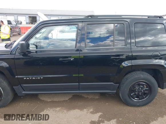 2014 Jeep Patriot Sport with VIN 1C4NJPBA4ED844253, listed as a IAAI auction lot 41879323 with 170,551 mi miles and . Bid and sale history available at carsss.com. Image 14.
