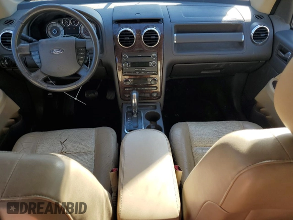 2008 Ford Taurus X Eddie Bauer with VIN 1FMDK07W78GA16734, listed as a Copart auction lot 86011354 with 214,429 mi miles and Salvage title. Bid and sale history available at DreamBid. Image 8.