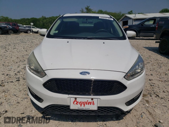 2015 Ford Focus SE with VIN 1FADP3F28FL332899, listed as a Copart auction lot 60055185 with 76,948 mi miles and Clean title. Bid and sale history available at DreamBid. Image 5.