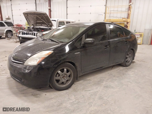 2007 Toyota Prius with VIN JTDKB20U373234398, listed as a IAAI auction lot 41986987 with 236,989 mi miles. Bid and sale history available at carsss.com. Image 2.