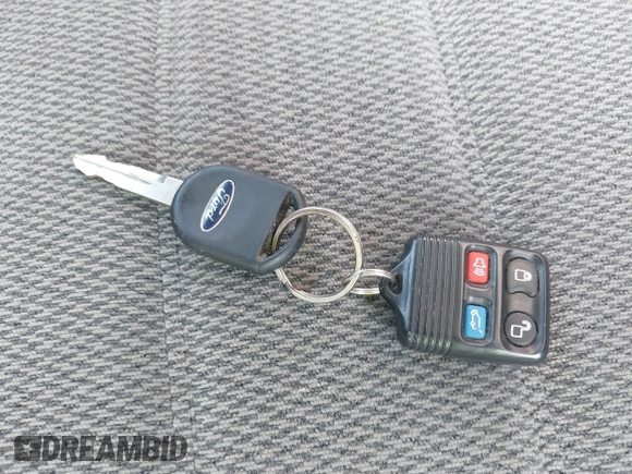 2004 Ford Explorer XLT z VIN 1FMZU73K74UB13312, wystawiony jako IAAI lot #42734477 z przebiegiem Nie podano mil oraz . Historia ofert i sprzedaży dostępna na DreamBid. Obrazek 11.