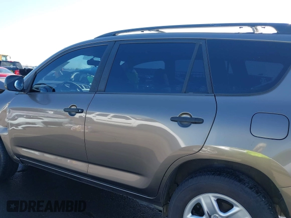 2009 Toyota RAV4 with VIN JTMZF33V09D008720, listed as a IAAI auction lot 42137305 with 154,585 mi miles and . Bid and sale history available at DreamBid. Image 14.