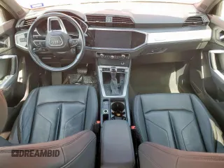 2021 Audi Q3 Premium with VIN WA1AUCF36M1060404, listed as a Copart auction lot 56501285 with 66,594 mi miles and Salvage title. Bid and sale history available at DreamBid. Image 8.