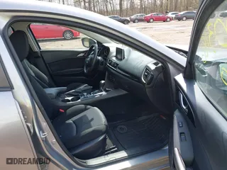 2016 Mazda Mazda3 i Sport with VIN JM1BM1T71G1335980, listed as a IAAI auction lot 42003186 with 131,015 mi miles. Bid and sale history available at carsss.com. Image 5.