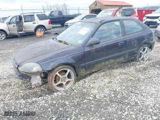 1998 Honda Civic DX with VIN 2HGEJ6342WH116620, listed as a IAAI auction lot 41934235 with 124,008 mi miles. Bid and sale history available at carsss.com. Image 2.