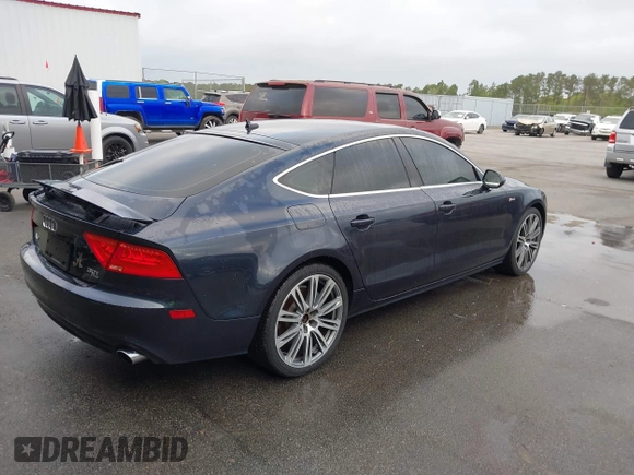 2012 Audi A7 Premium Plus with VIN WAUYGAFC6CN126289, listed as a IAAI auction lot 41945024 with 126,465 mi miles and . Bid and sale history available at DreamBid. Image 4.