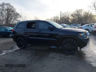 2019 Jeep Grand Cherokee Laredo E with VIN 1C4RJFAG4KC608897, listed as a IAAI auction lot 41771603 with 106,525 mi miles and . Bid and sale history available at DreamBid. Image 13.