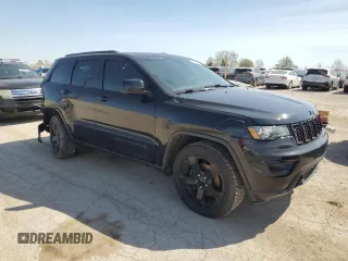 2018 Jeep Grand Cherokee Laredo E with VIN 1C4RJFAGXJC500377, listed as a Copart auction lot 54238755 with 64,617 mi miles and Salvage Title. Bid and sale history available at DreamBid. Image 4.