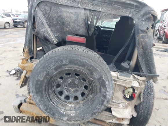 2003 Jeep Wrangler X with VIN 1J4FA39SX3P329386, listed as a IAAI auction lot 41407594 with 140,390 mi miles. Bid and sale history available at carsss.com. Image 14.