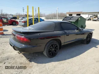 1997 Pontiac Firebird with VIN 2G2FS22K8V2212704, listed as a Copart auction lot 48853145 with 130,474 mi miles and Salvage Title. Bid and sale history available at carsss.com. Image 3.